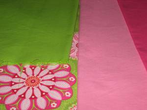 Pink and lime green fabrics before cutting