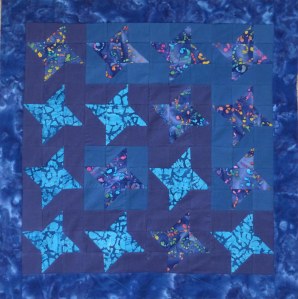 Batik Friendship Stars in a Small Quilt