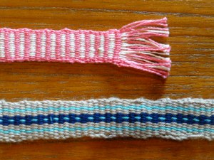 Two bands woven on an inkle loom